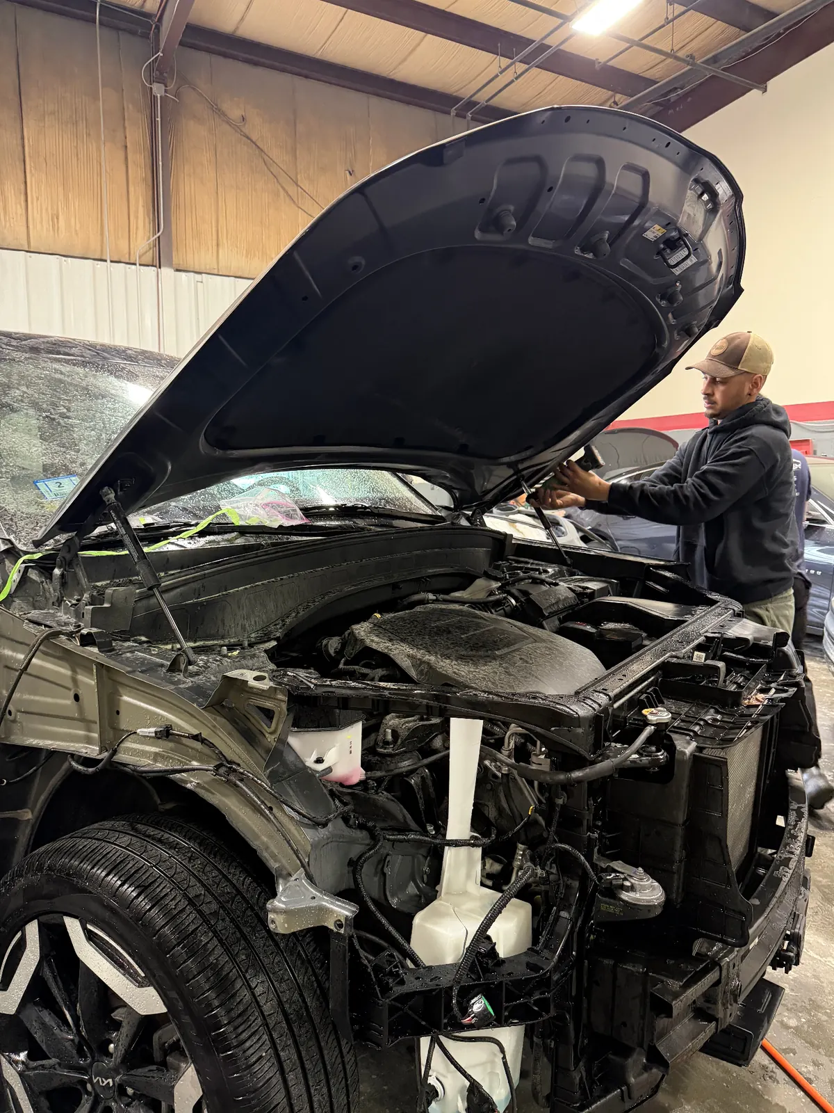 Engine bay exposed during front-end collision repair